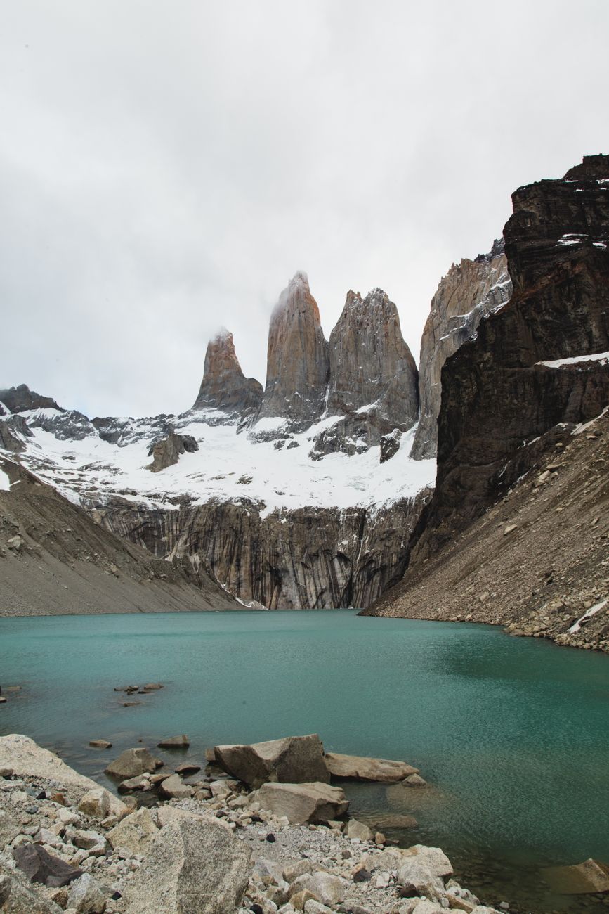 Towering granite towers of Torres del Paine framed by glacial water